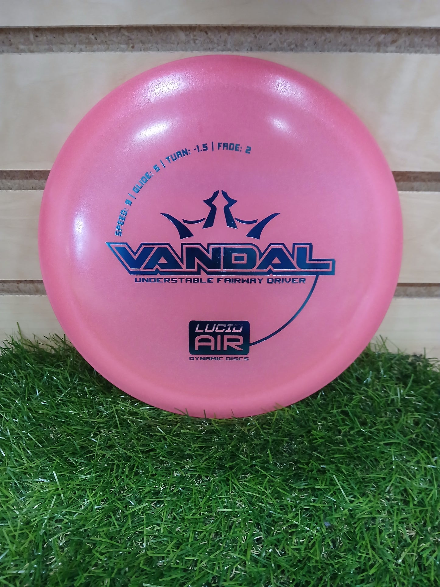 Pink Dynamic Discs Lucid Air Vandal fairway driver disc golf disc on grass