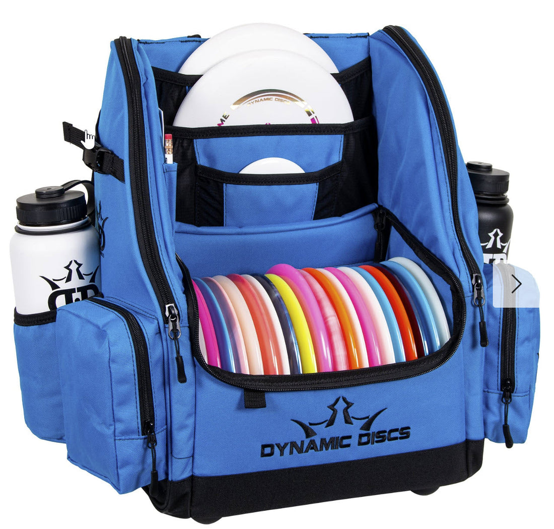 Blue Dynamic Discs bag filled with colorful disc golf discs and water bottles