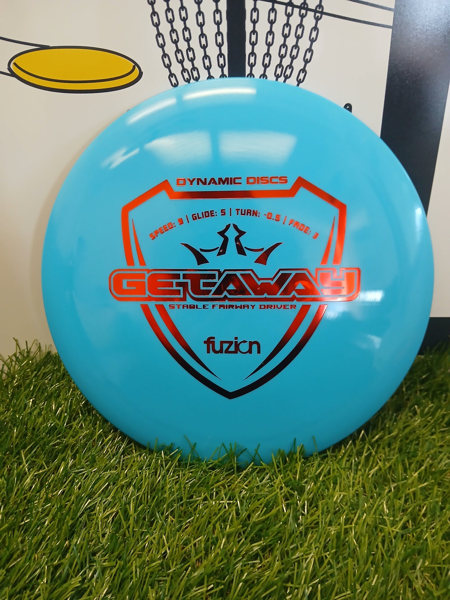 Dynamic Discs Getaway Fuzion stable fairway driver disc golf disc on grass
