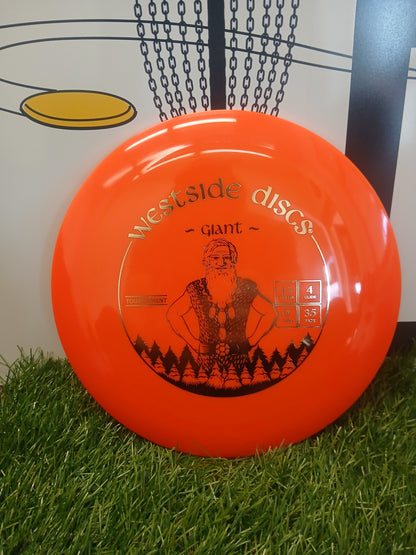 Westside Discs Giant disc golf driver on grass, tournament model with speed 13, glide 4, fade 3.5