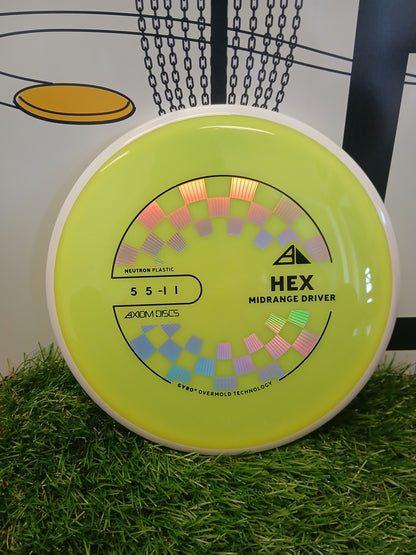 Axiom Discs HEX Midrange Driver in Neutron Plastic, featuring Gyro Overmold Technology, displayed on grass.