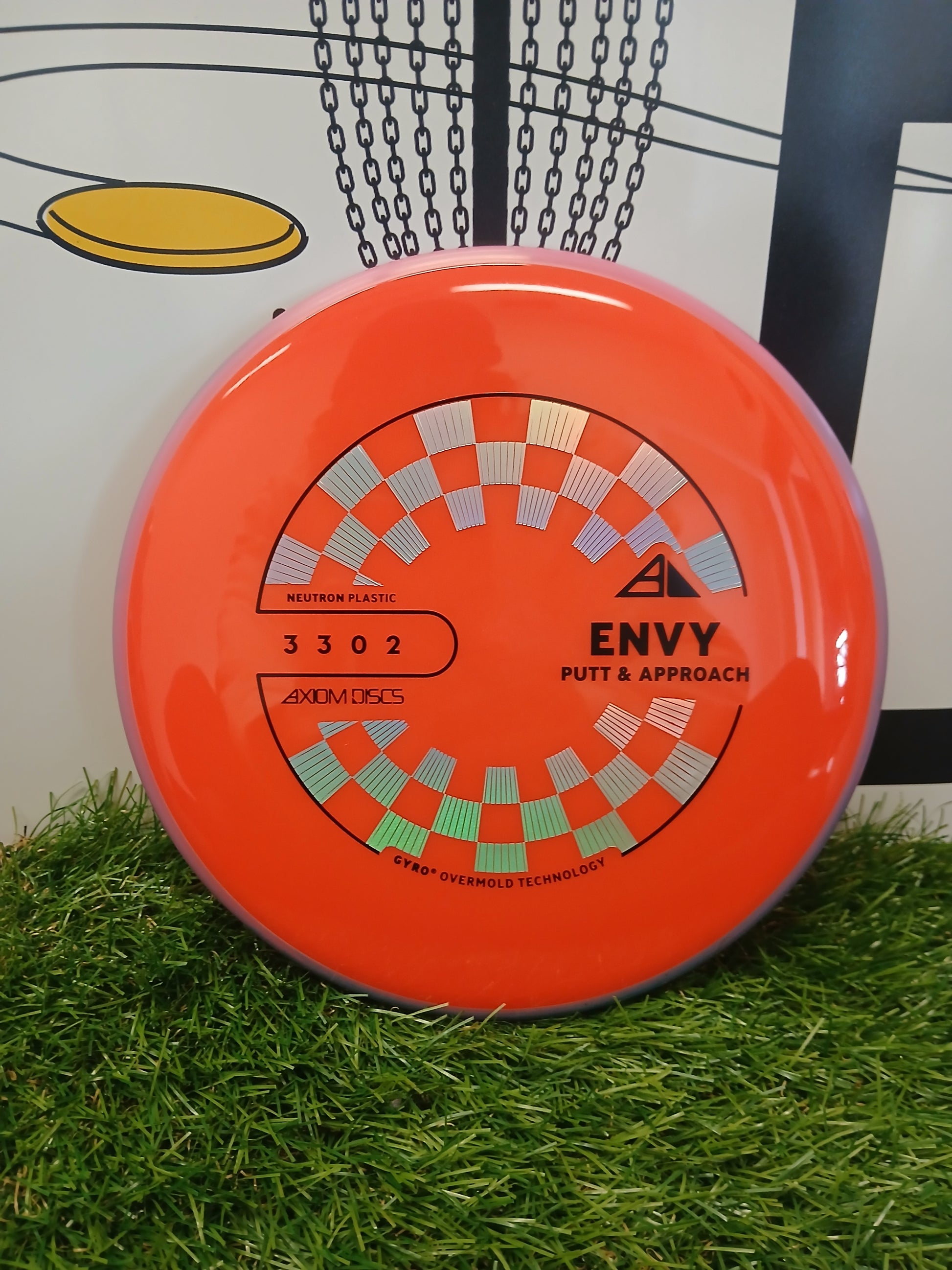 Axiom Discs Envy putter disc in orange Neutron plastic, designed for putt and approach shots on grass.