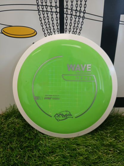 MVP Wave distance driver disc golf disc in neon green, ideal for long throws and disc golf courses.