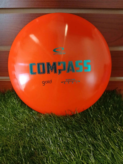 Latitude 64 Gold Compass
